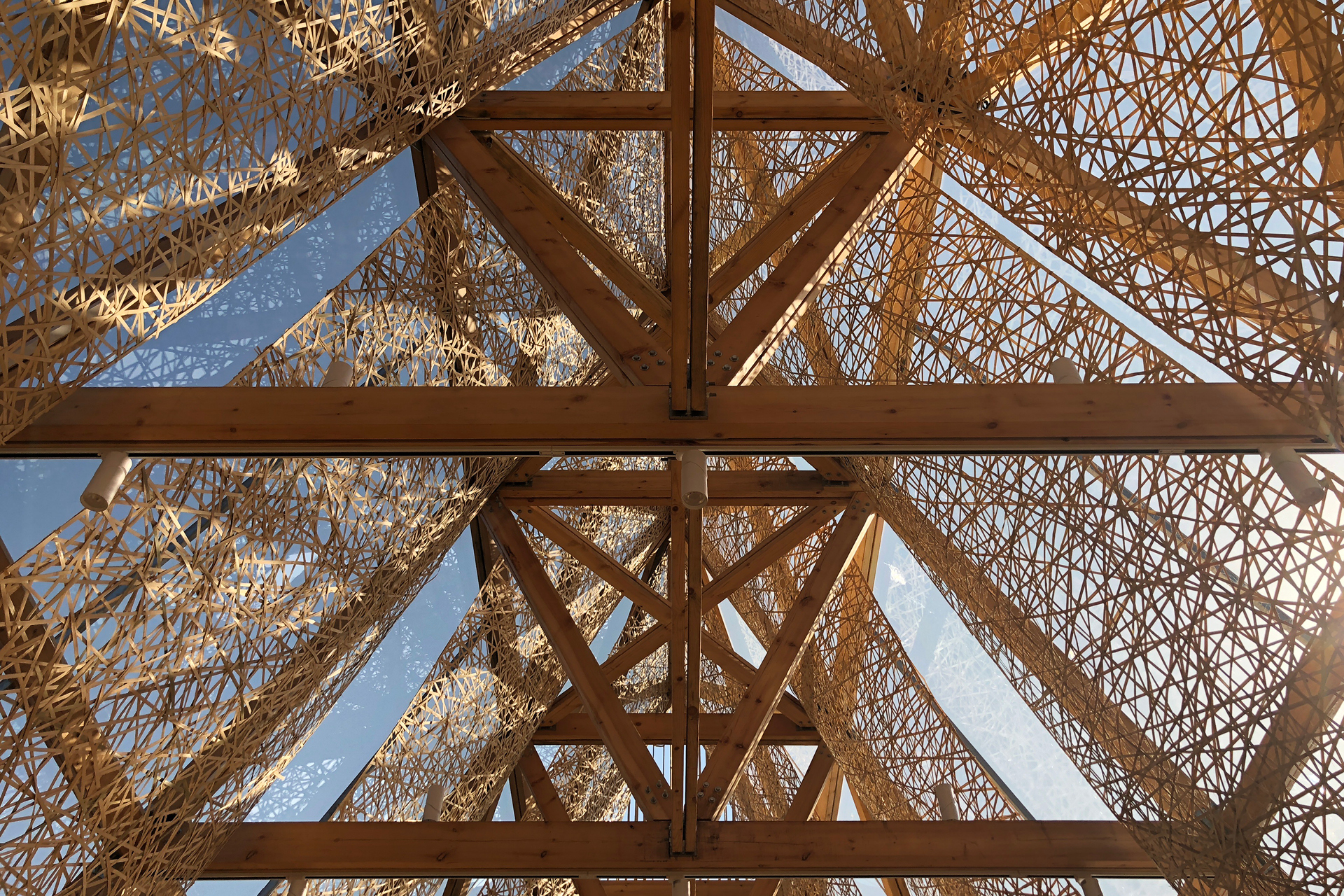 Chengdu, view of roof of wooden art pavillion on lake.jpg