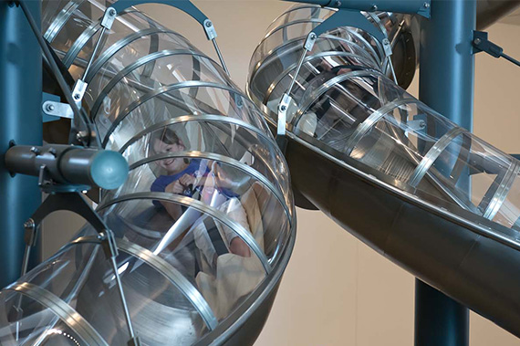 Photograph of two children in a giant metalic indoor slide in QAGOMA.jpg