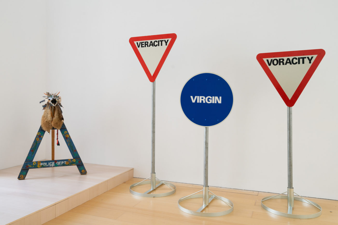 Road signs with unusual descriptions : veracity, virgin, voracity (left to right).jpg