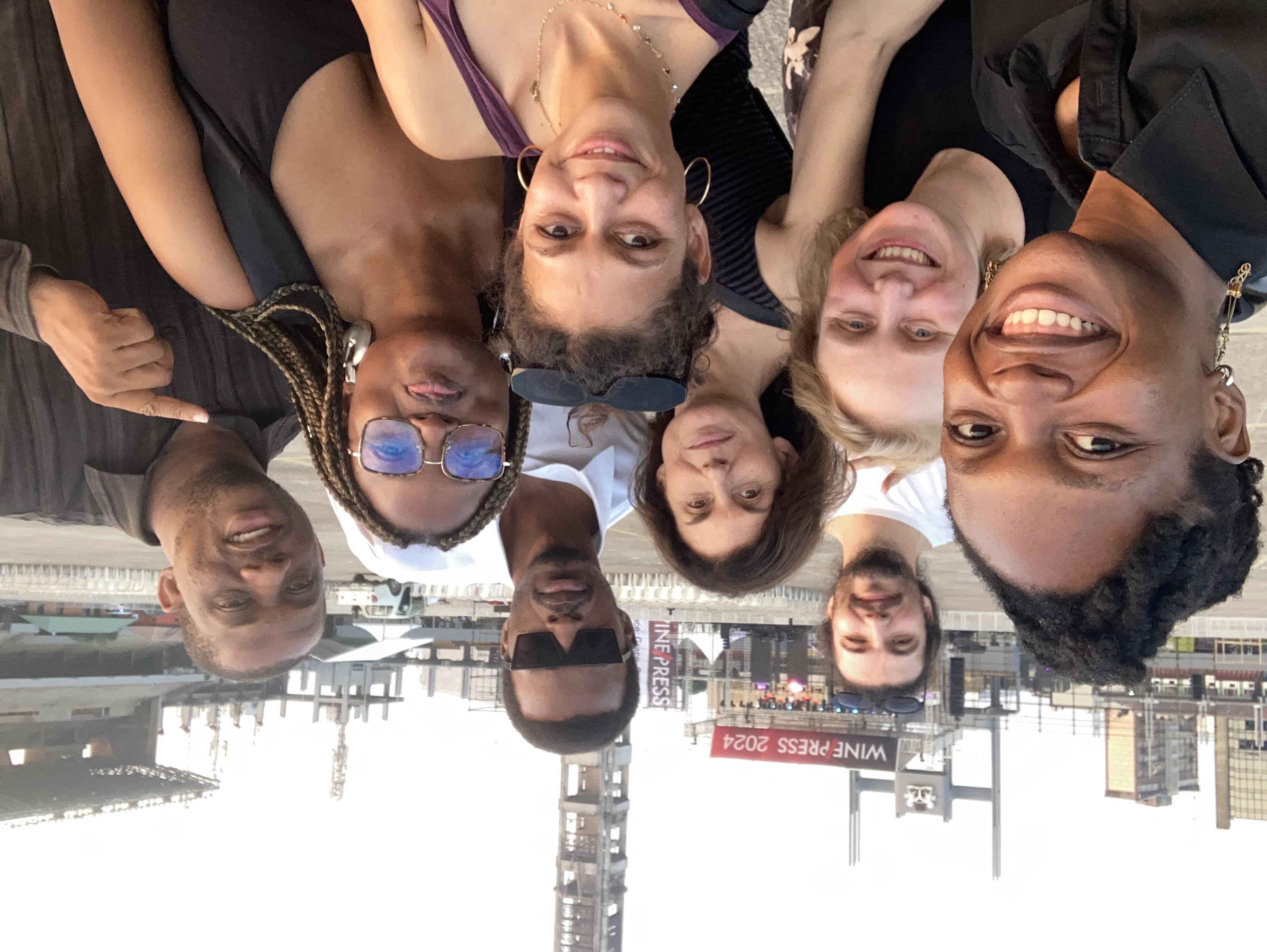 Kathryn Weir, Folakunle Oshun and Lagos Biennale team smiling (except Folakunle).jpg