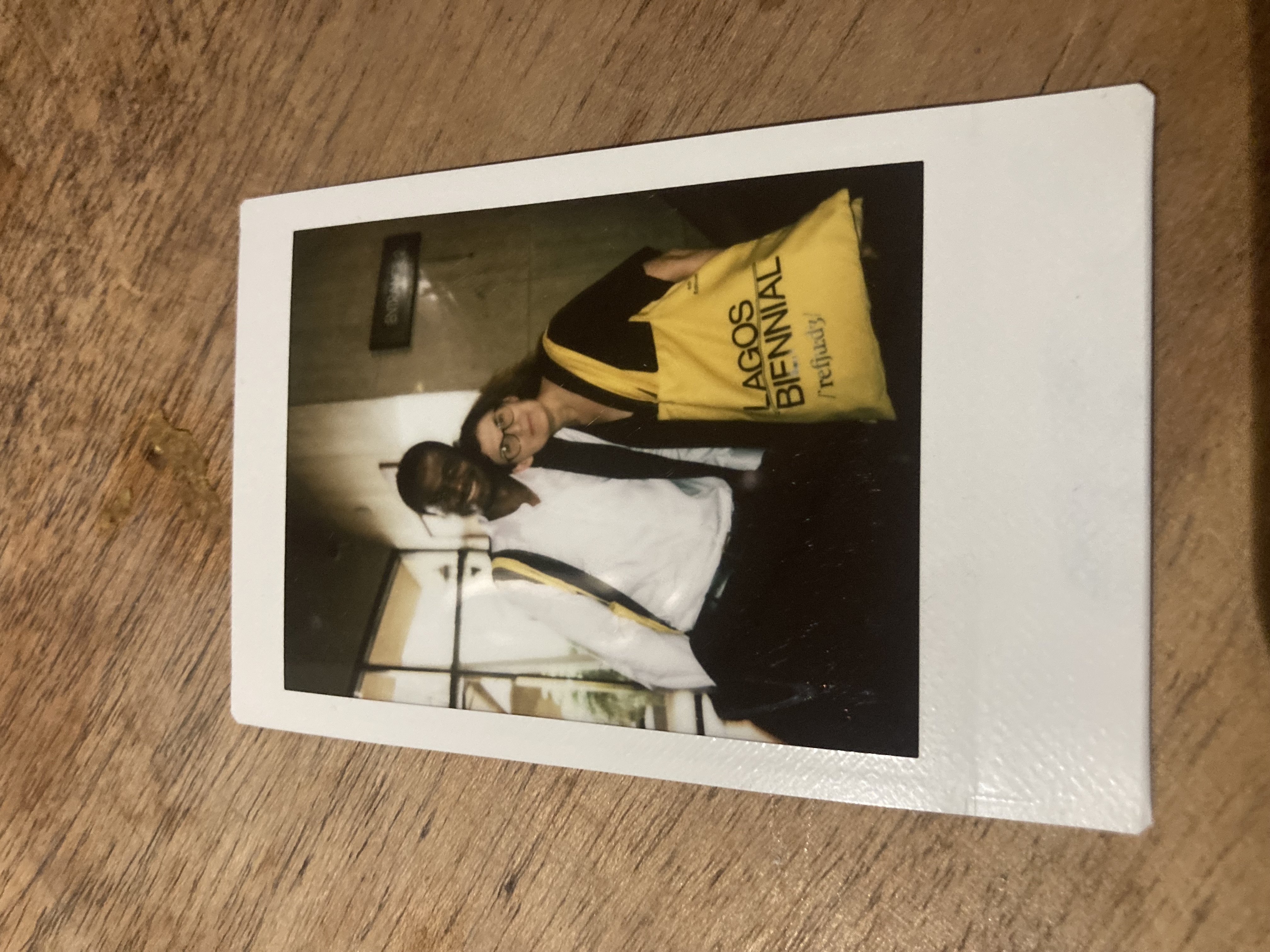 Polaroid image of Kathryn Weir, Folakunle Oshun, smiling.jpg